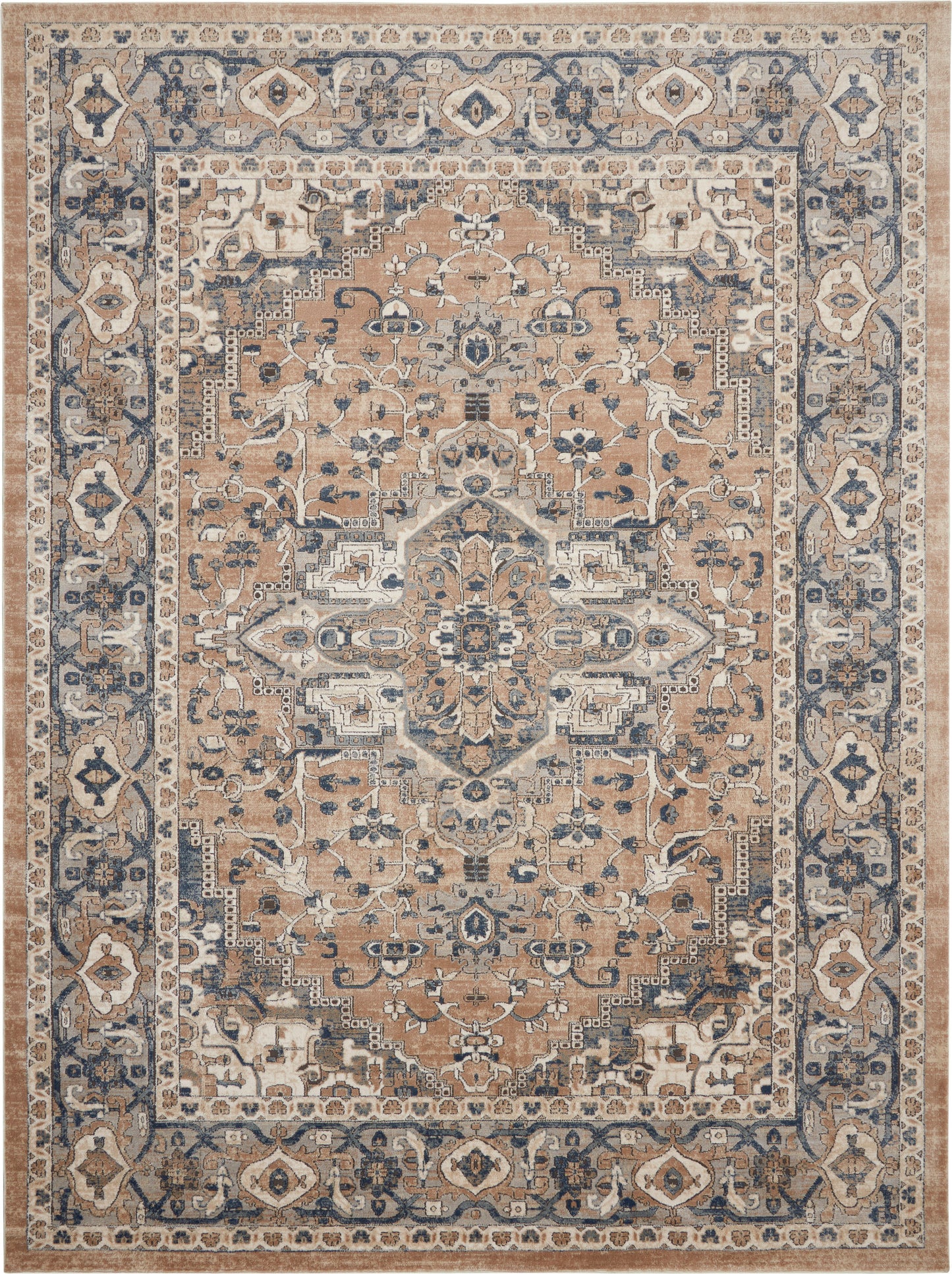 Rectangular farmhouse-style rug with a central medallion on a warm beige field, navy border, ivory/blue floral motifs.