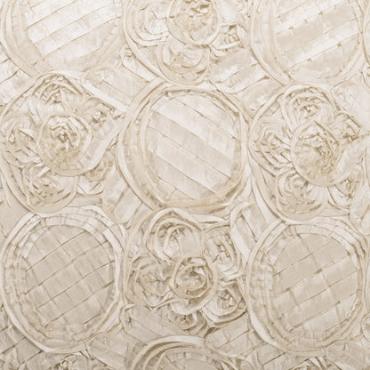 Beige fabric with embossed circular rosette patterns and quilted lines, soft neutral texture.