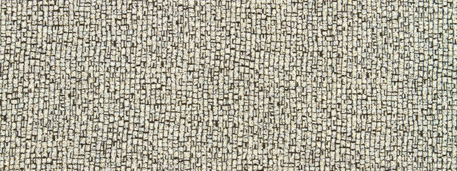 Close-up of beige boucle fabric with cream-tan speckled weave; upholstery material for sofa or chair.