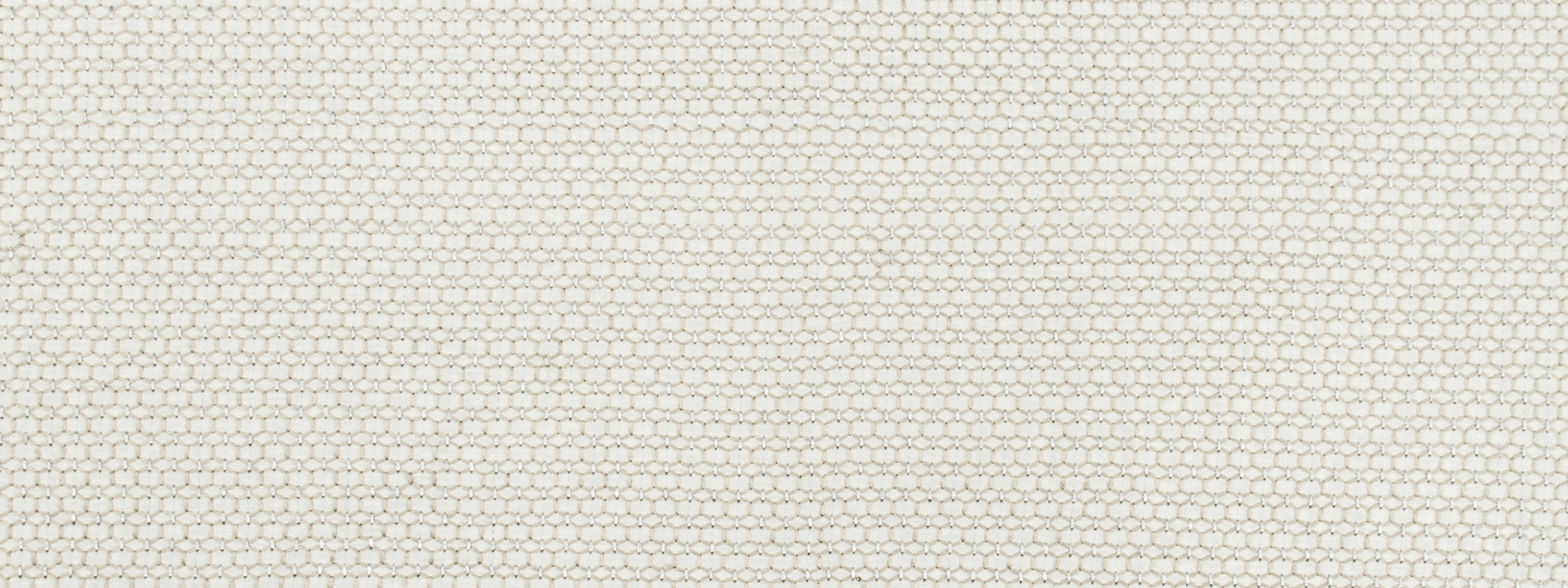 Silver drapery fabric close-up with a tight, uniform woven texture.