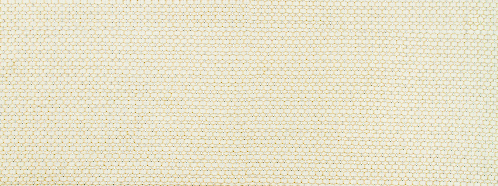 Cream fabric with tiny yellow dotted grid pattern; lightweight woven textile.