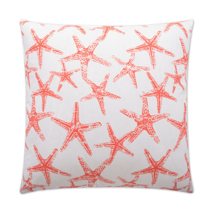 Square decorative throw pillow with a coral starfish pattern on salmon-colored fabric, coastal beach style.