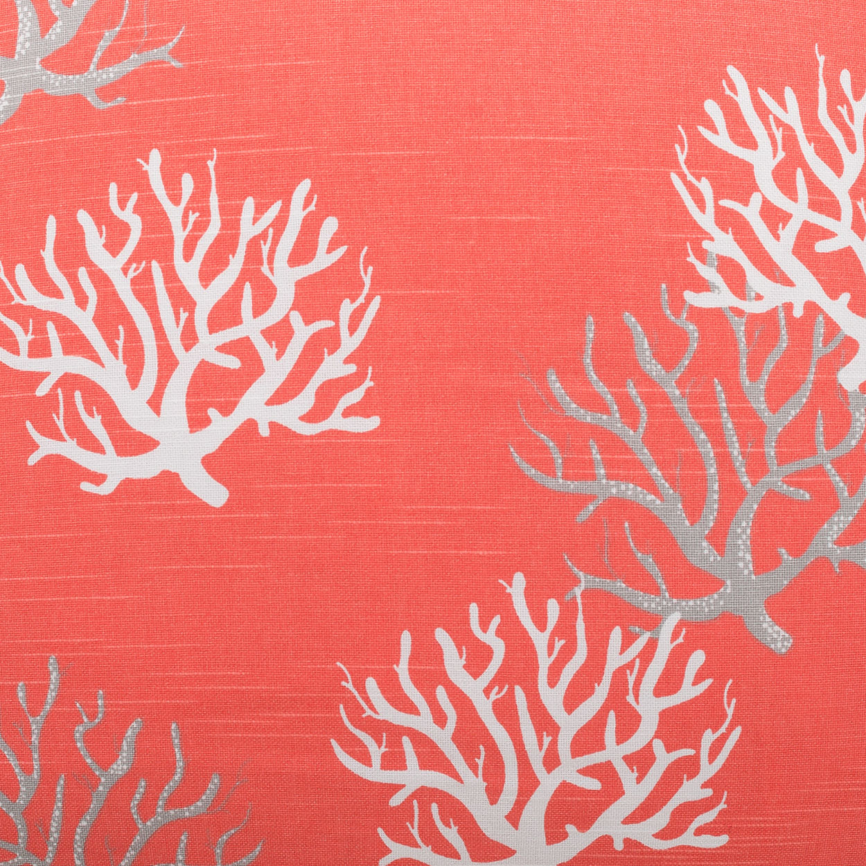 Orange fabric with white and silver coral reef prints in a linen-like weave.
