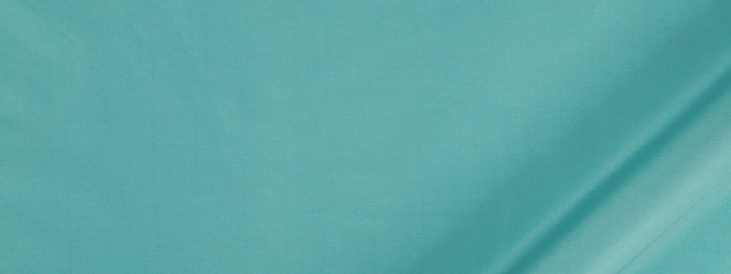 Teal fabric swatch with smooth texture and a diagonal crease across the right side.