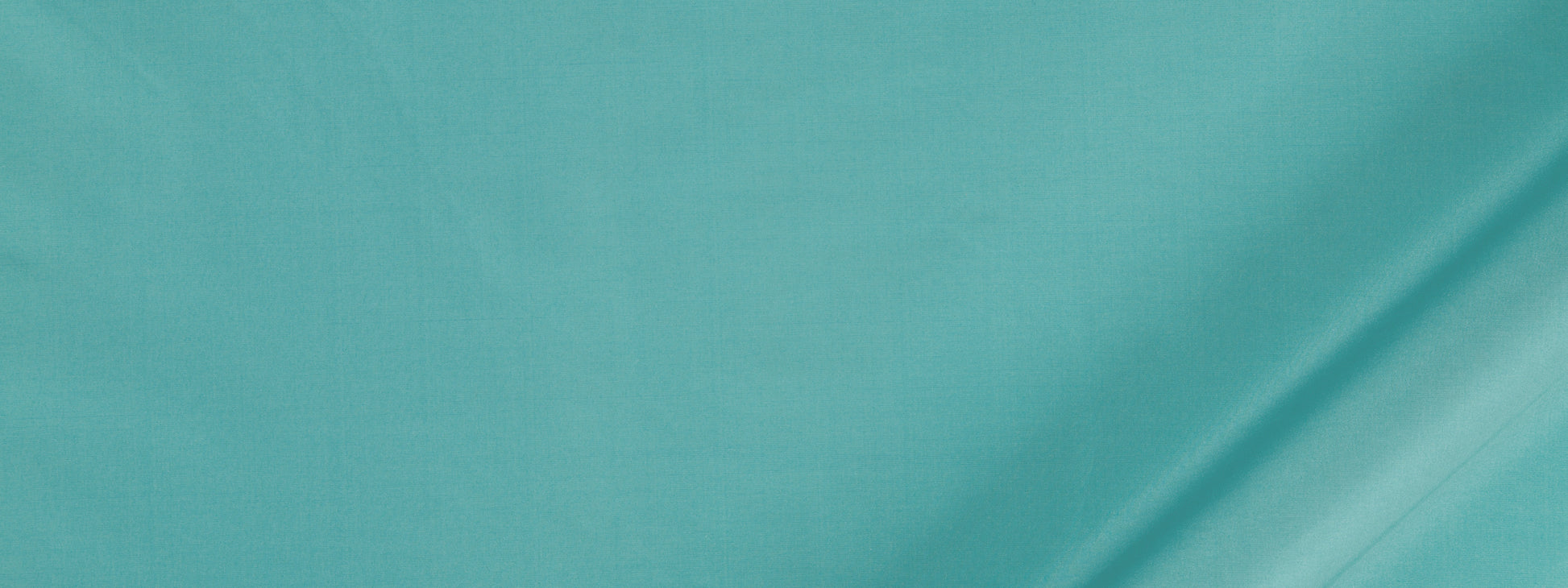 Teal fabric swatch with smooth texture and a diagonal crease across the right side.
