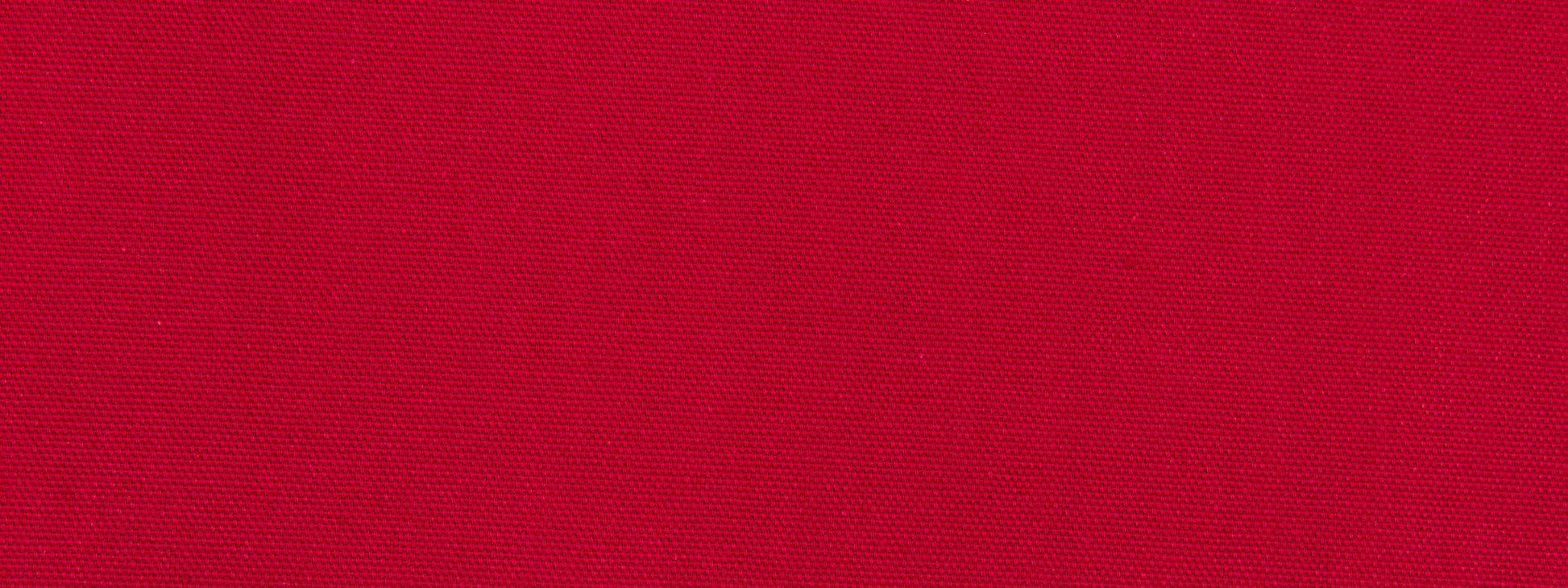 Close-up of rich red woven fabric texture; soft textile background for apparel or upholstery.