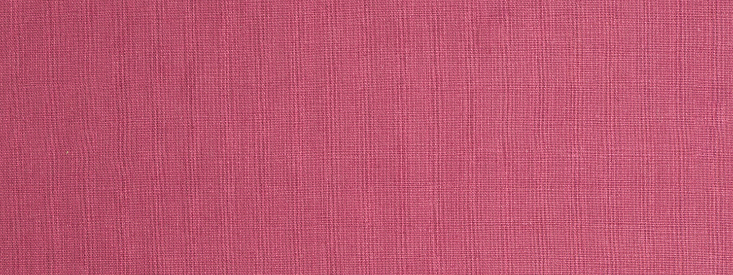 Pink woven linen fabric texture with visible weave and soft color gradient backdrop
