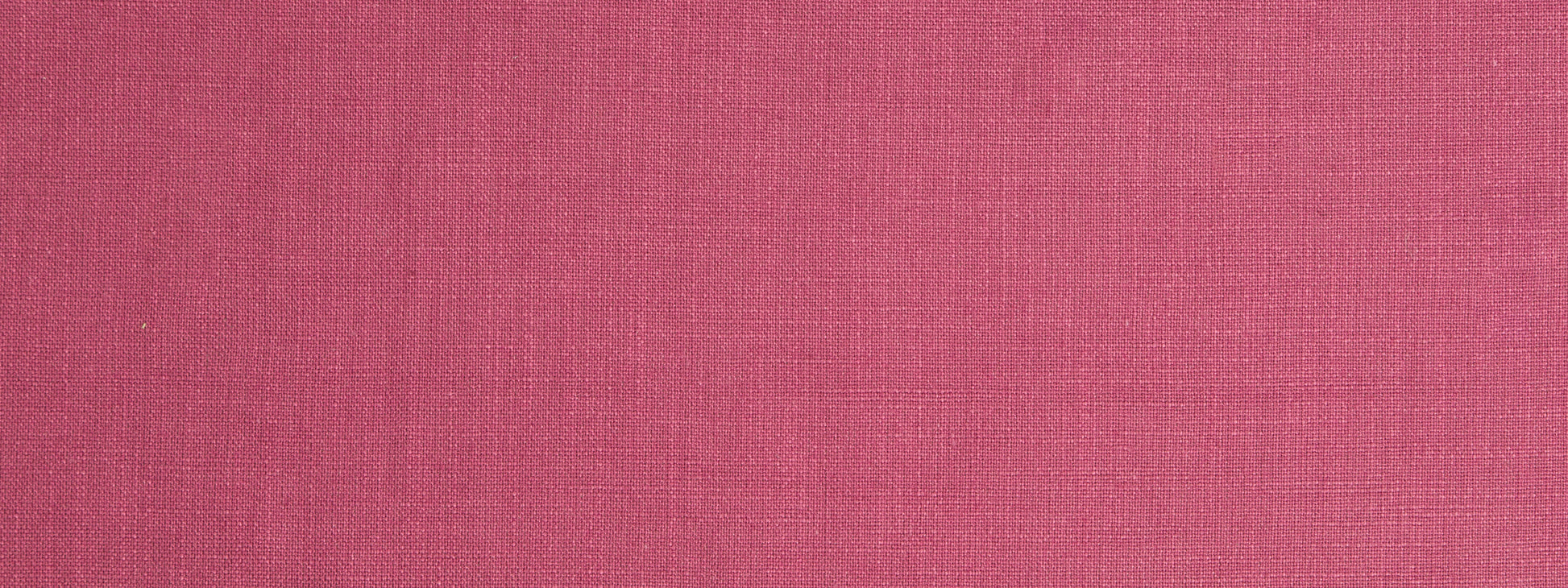 Pink woven linen fabric texture with visible weave and soft color gradient backdrop