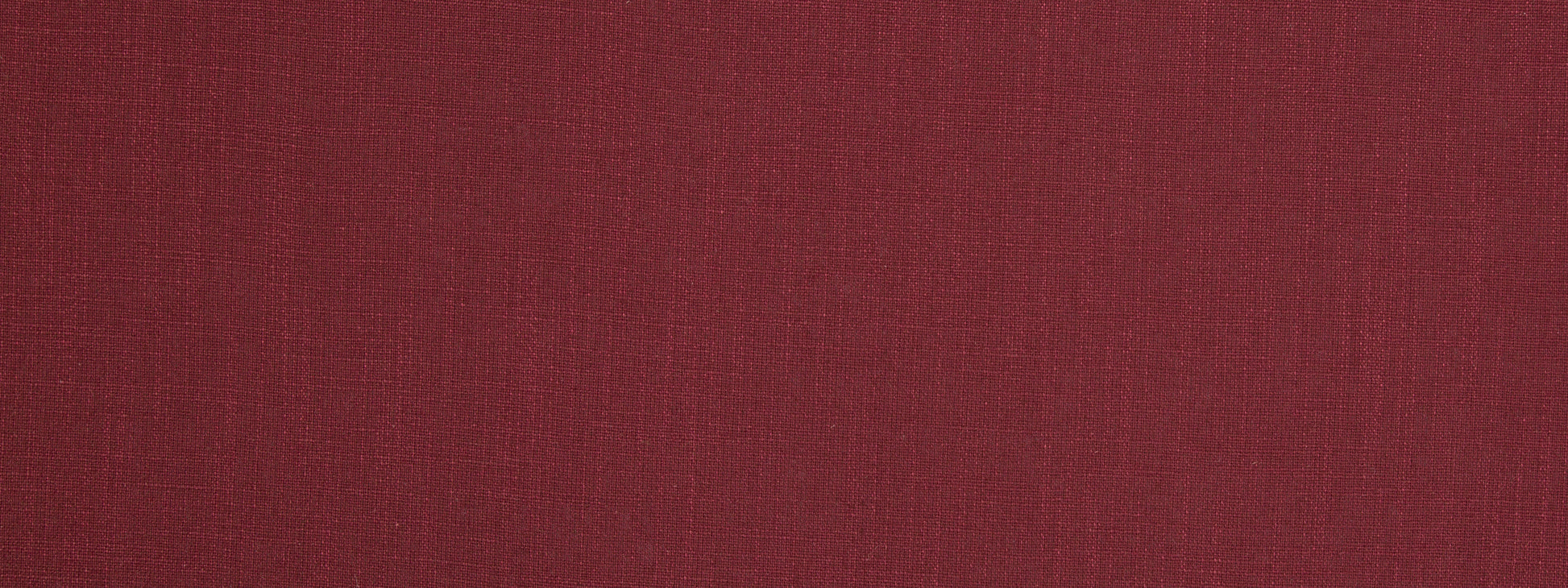Crimson fabric texture with a subtle weave, suitable for multipurpose upholstery or fashion use.