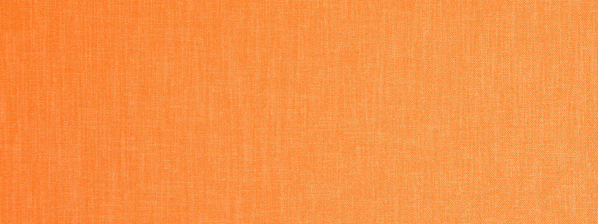 Close-up of bright orange woven fabric texture with visible weave pattern.