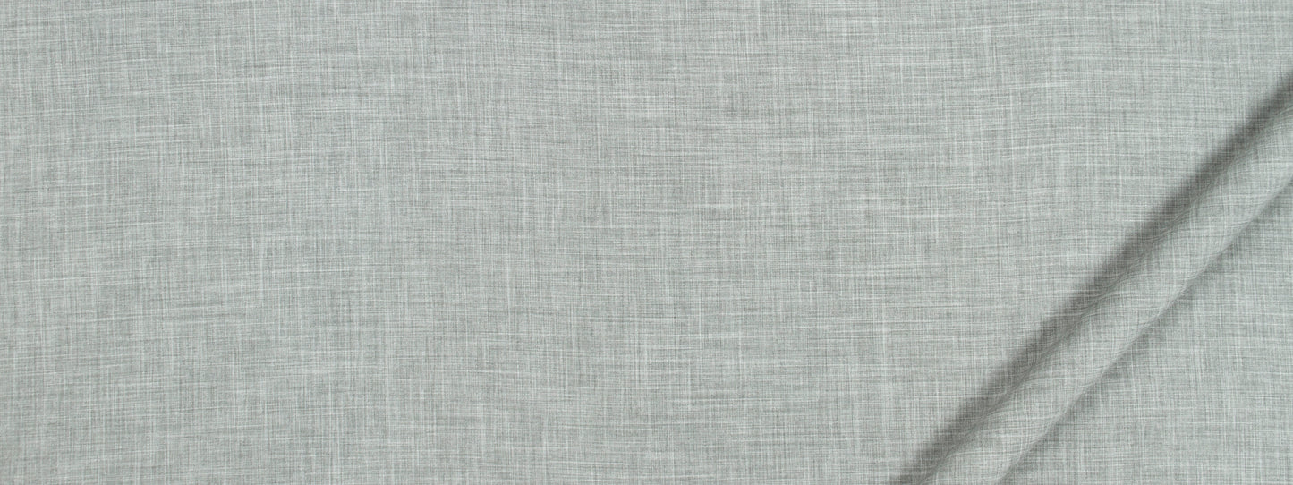 Close-up of light gray linen fabric with subtle weave and diagonal fold.