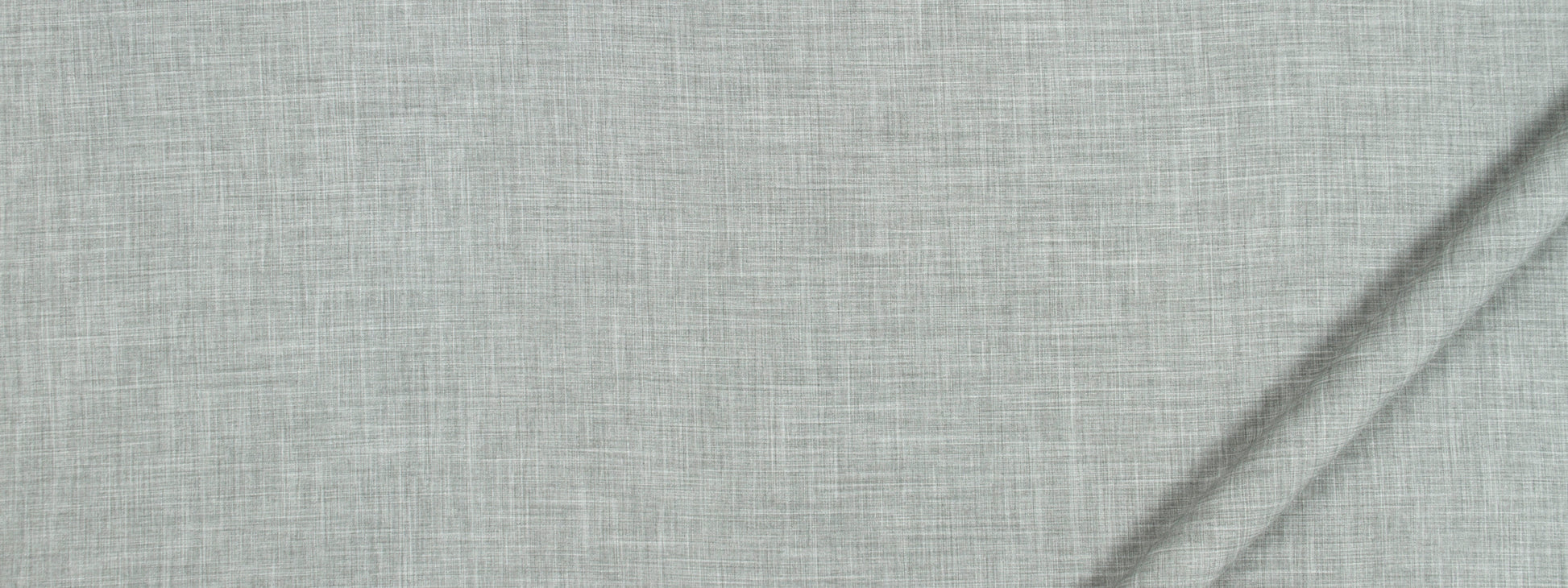 Close-up of light gray linen fabric with subtle weave and diagonal fold.