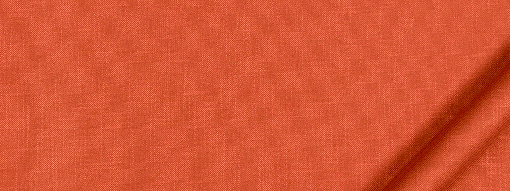 Bright orange woven fabric texture with visible weave and a subtle diagonal shadow at the top-right.