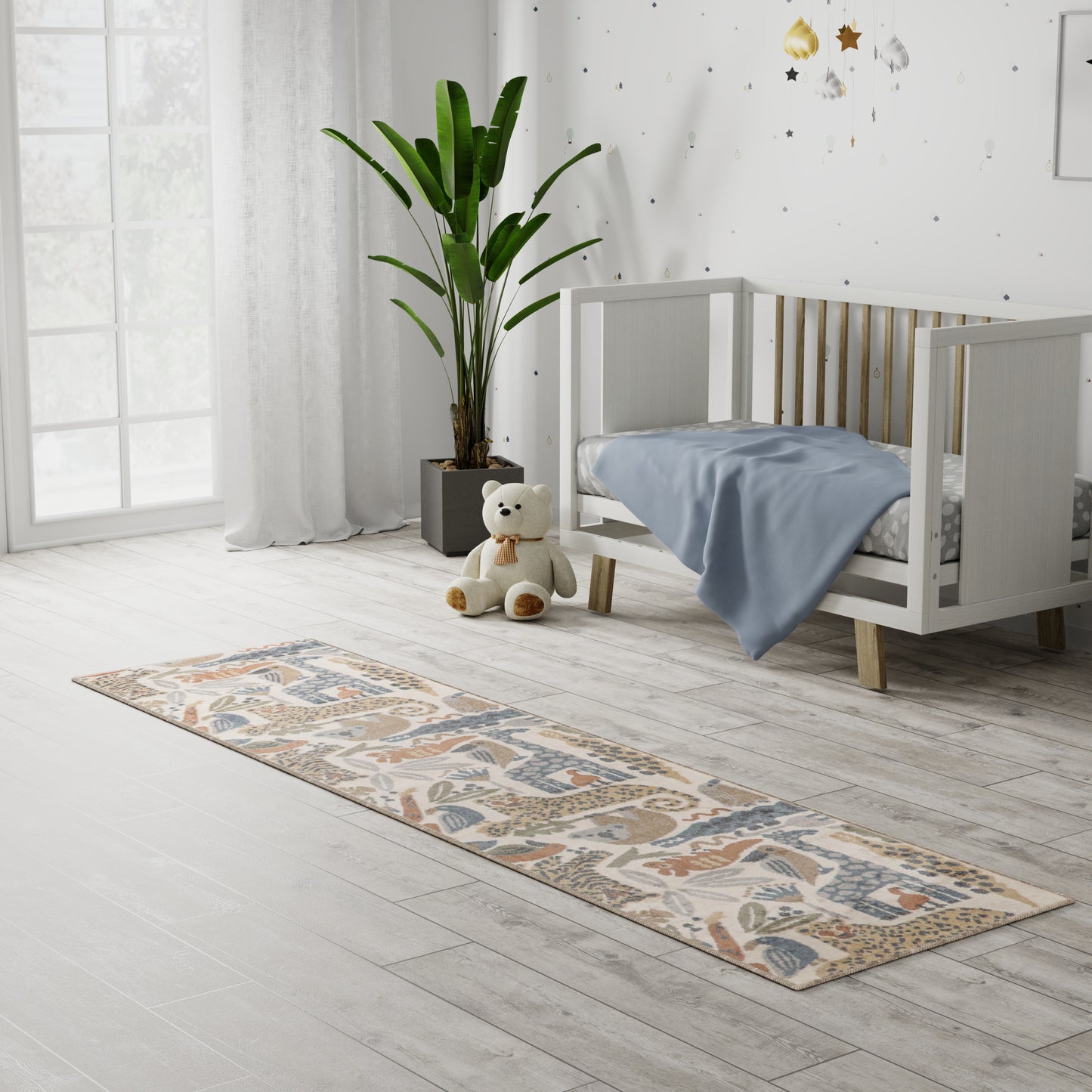 Bright nursery with white crib, pale blue blanket, beige patterned runner rug, teddy bear, tall potted plant, light wood floor.