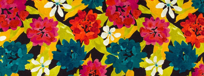 Bright tropical floral fabric with red, pink, yellow, teal flowers and white accents on black background.