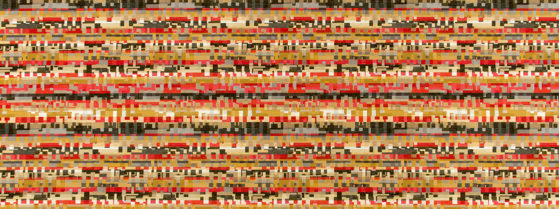 Crimson upholstery fabric with red, orange, tan and black geometric blocks in a kilim-inspired pattern; woven texture.