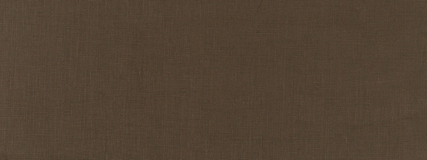 Close-up of brown linen-textured fabric with a subtle weave, rustic warm backdrop.