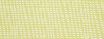 Close-up of lime upholstery fabric with a white square grid pattern and a soft woven texture.