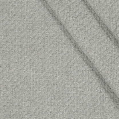 Light gray textured wool upholstery fabric with a soft weave and diagonal fold lines.