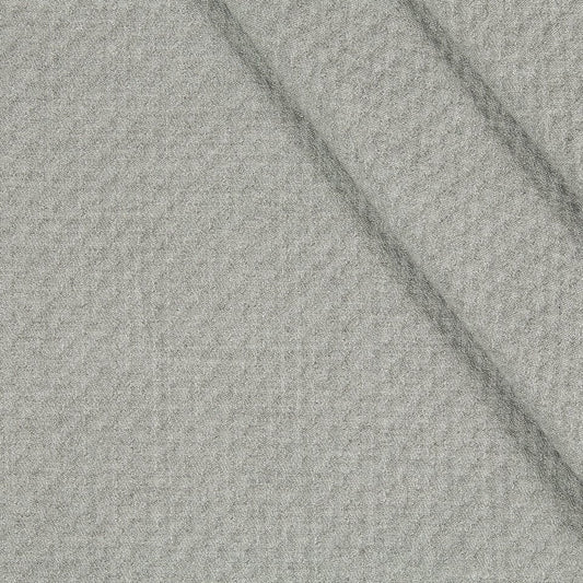 Light gray textured wool upholstery fabric with a soft weave and diagonal fold lines.