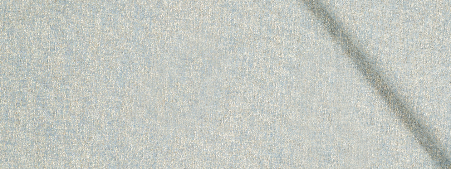 Close-up of light blue woven fabric texture with subtle weave pattern and a diagonal shadow.