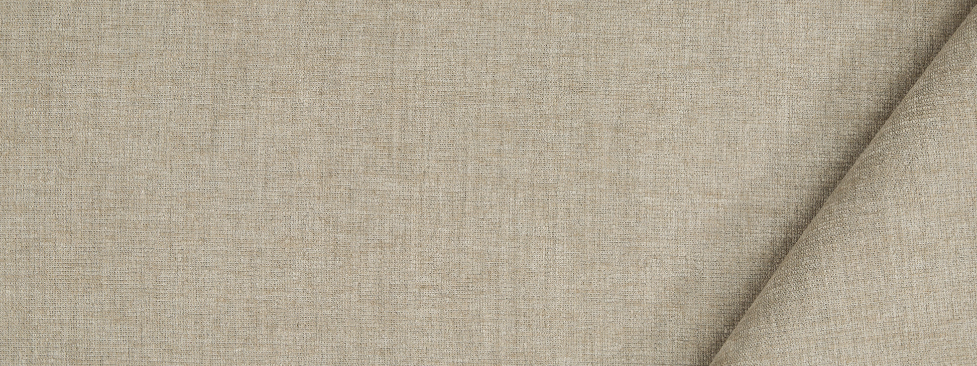 Beige plush fabric with a diagonal fold, warm neutral texture.