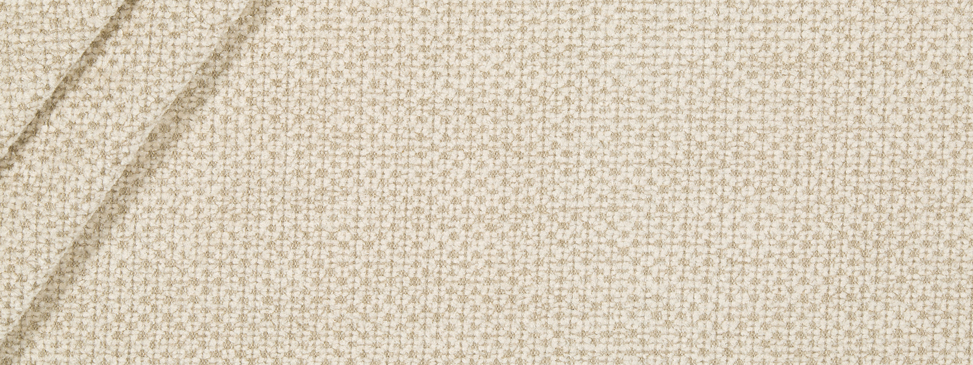 Beige Pearl chenille upholstery fabric close-up with a soft pile and subtle diagonal seam lines.