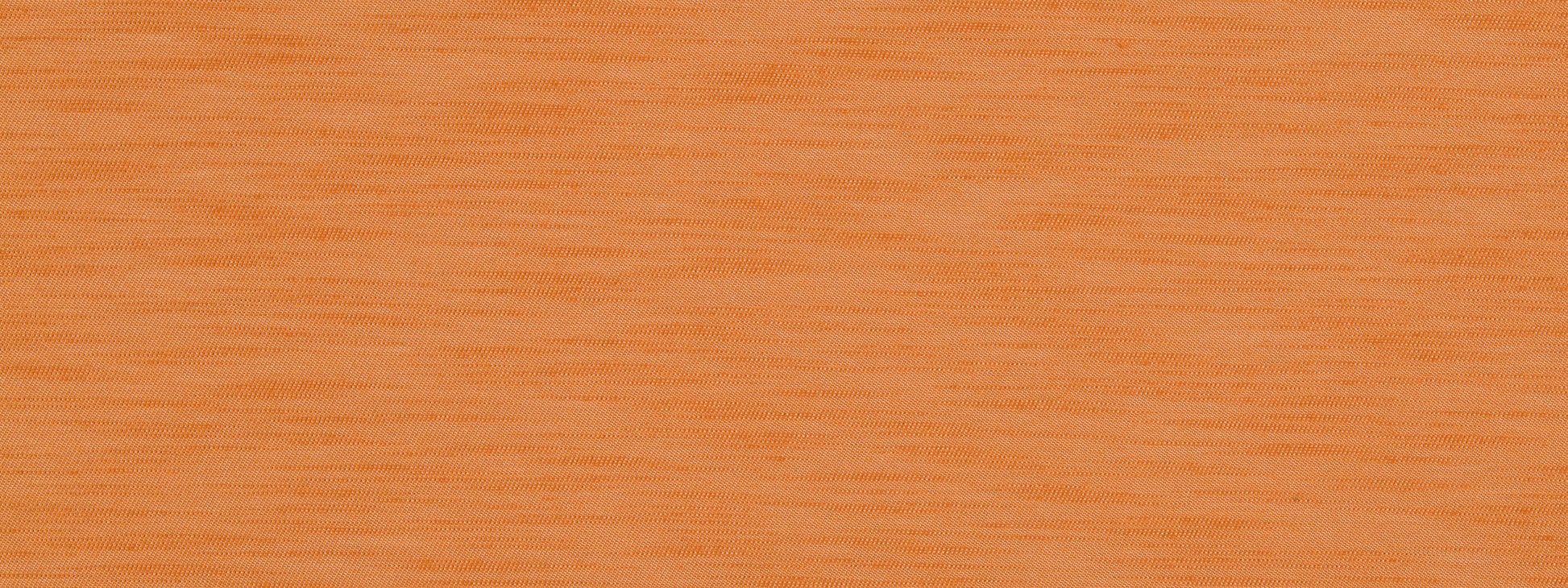 Close-up of silky slub upholstery fabric in sunrise tones.