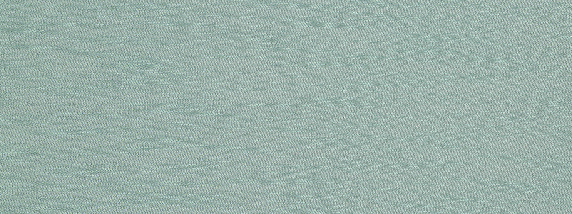 Soft seafoam teal textured surface with subtle brushed grain, matte finish