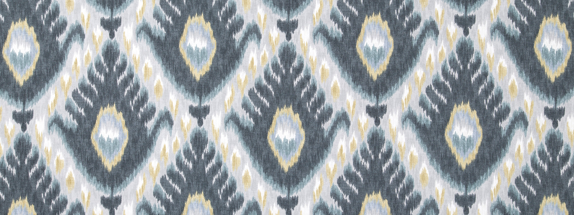 Blue-gray & white ikat diamond fabric pattern with pale yellow accents.