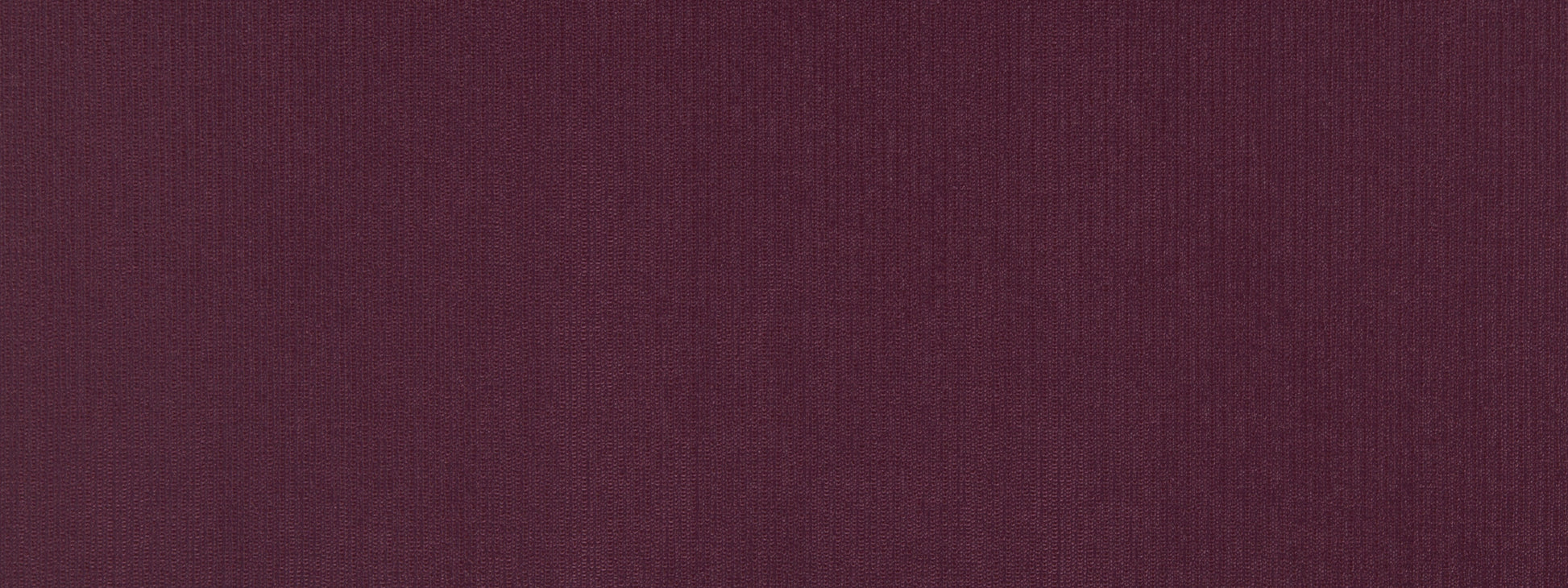 Deep burgundy upholstery fabric texture with a subtle weave and rich color.
