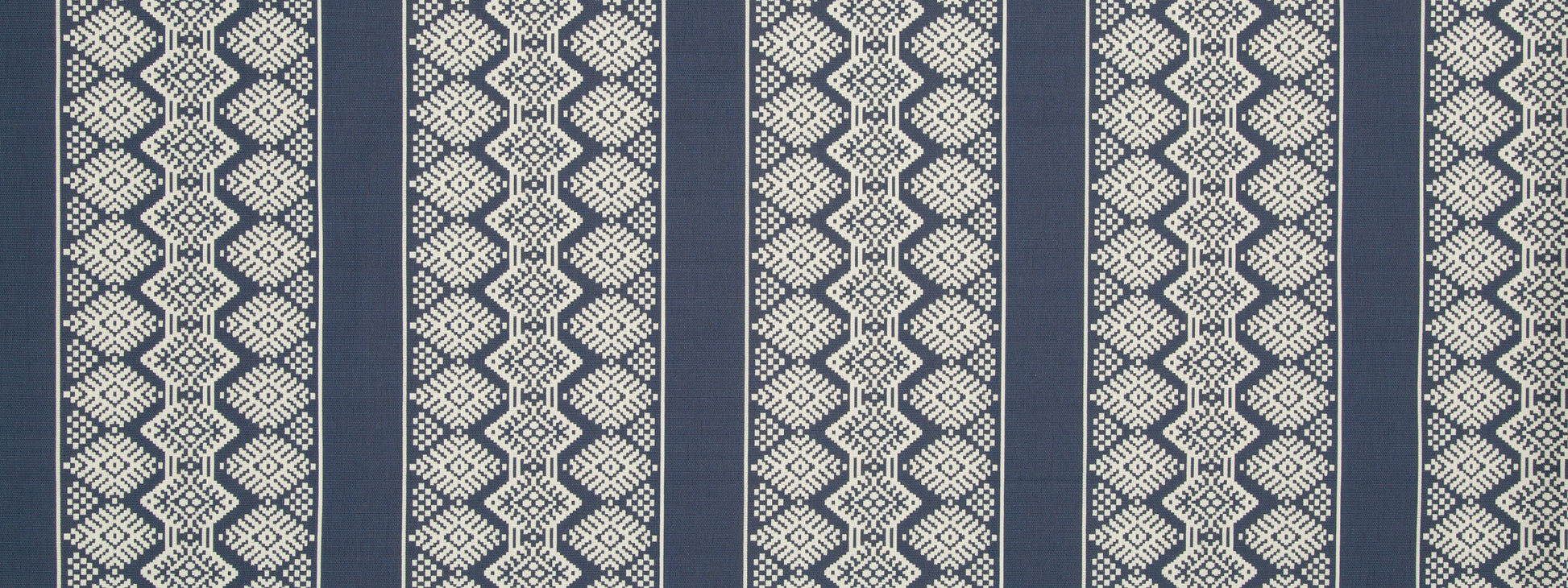 Navy blue and beige woven upholstery fabric with a geometric diamond pattern and vertical stripes.