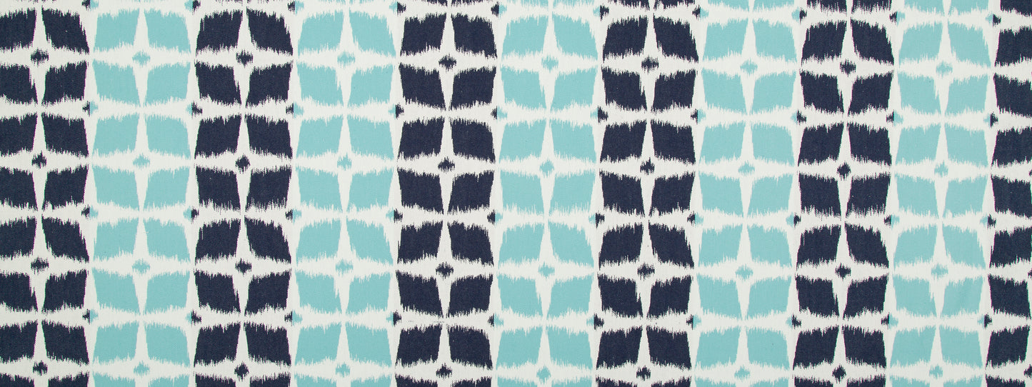 Navy and teal geometric pattern fabric with vertical columns of star-like blocks, a modern lattice motif.