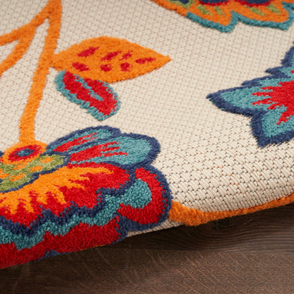 Brown-to-peach gradient color block beside a colorful woven rug edge; abstract home decor backdrop.