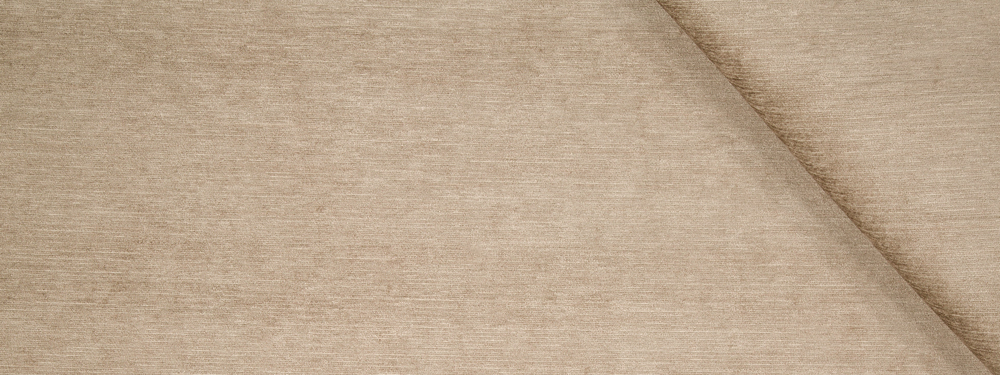 Beige woven fabric texture with diagonal crease; warm tan upholstery or drapery fabric.