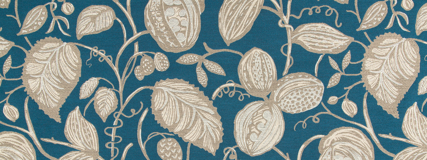 Teal fabric with beige botanical leaves & fruit motifs; vintage-style upholstery fabric.