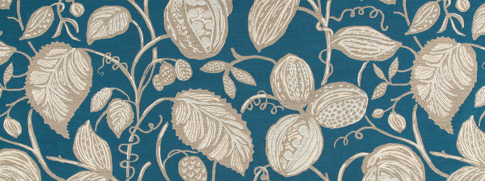 Teal fabric with beige botanical leaves & fruit motifs; vintage-style upholstery fabric.