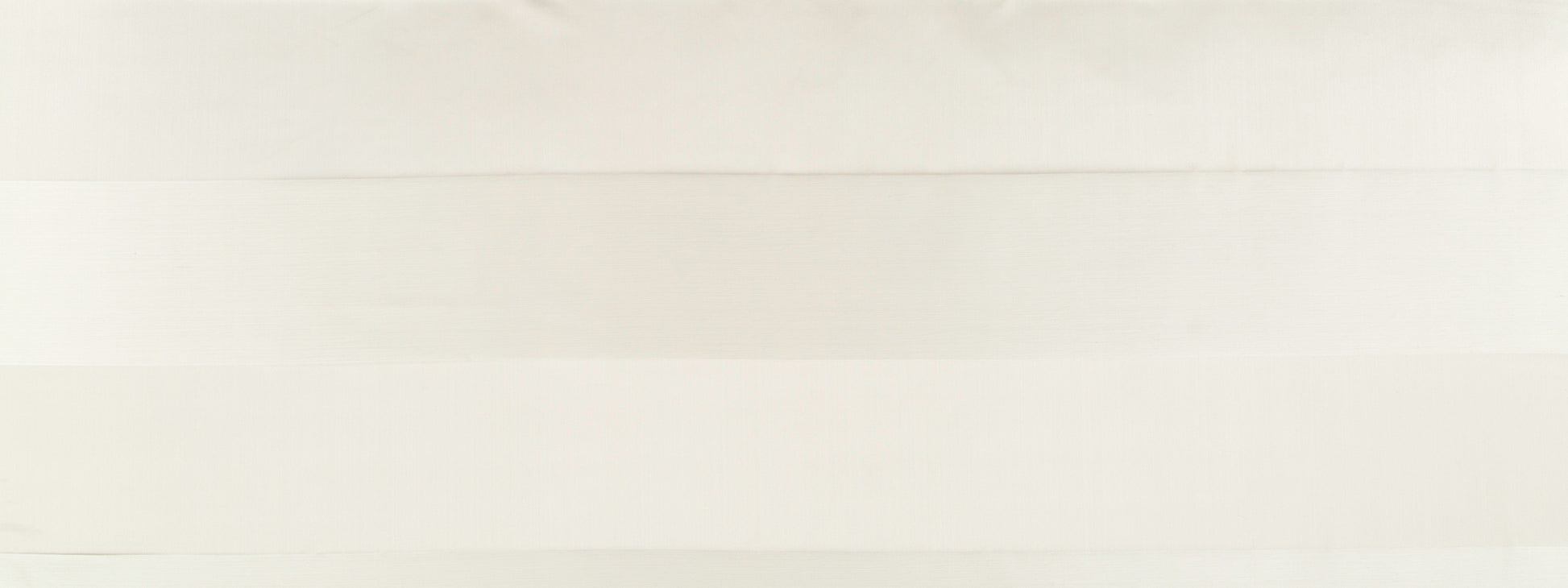 Cream-colored textured drapery fabric with a subtle horizontal stripe pattern.