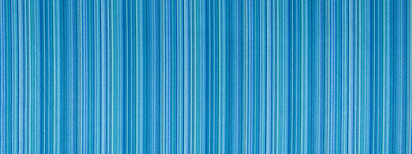 Blue upholstery fabric with a zigzag stripe pattern in varying blues; woven textile.
