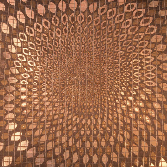 Bronze metallic fabric featuring concentric oval scales that form a tunnel-like optical pattern; shiny copper-brown jacquard.