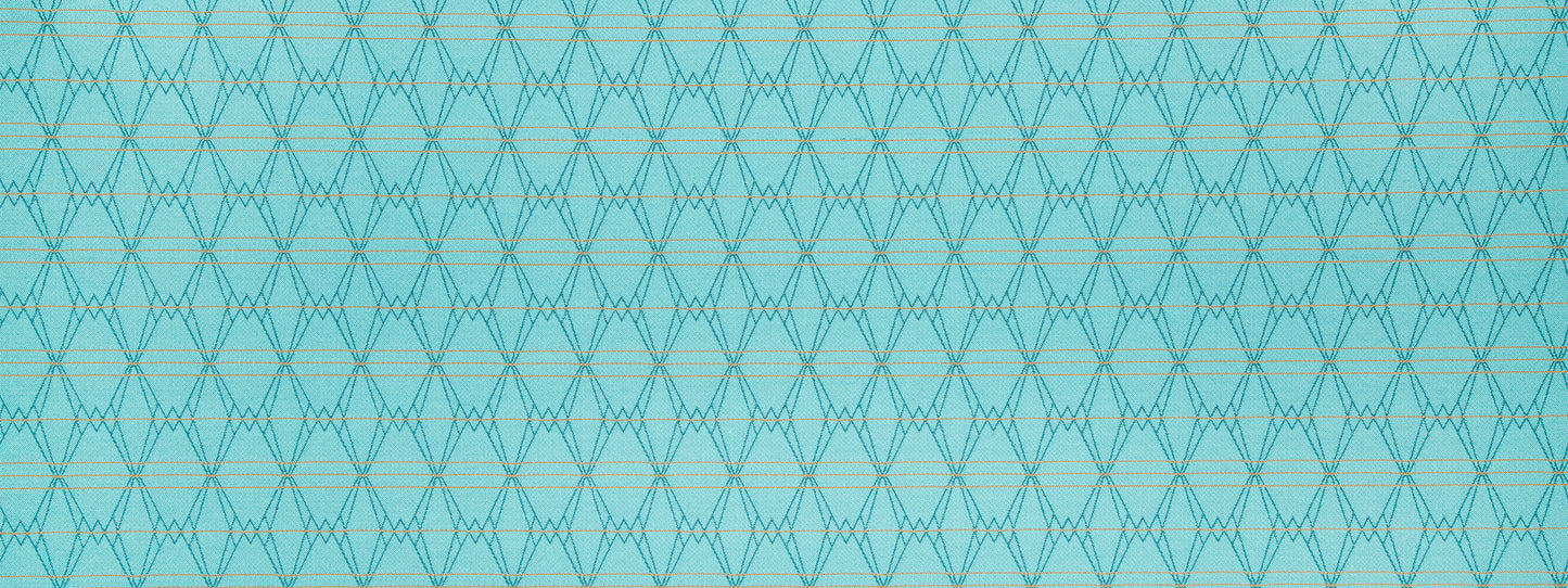 Turquoise geometric lattice fabric with interlocking diamond shapes.