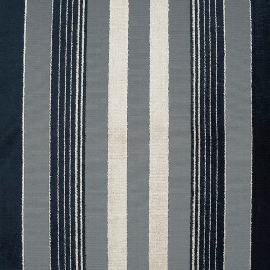 Vertical striped fabric rug in navy, gray, and ivory with bold and slim stripes.