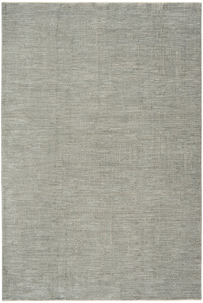 Grey-toned flatweave rug with subtle textured weave and neutral, soft appearance.