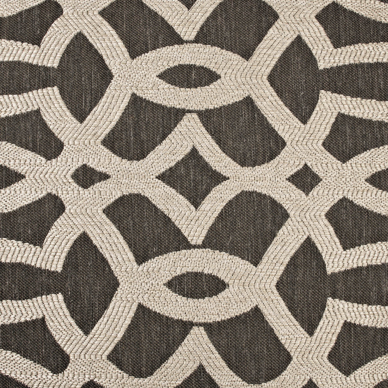 Beige braided rope knot lattice on dark brown fabric; geometric interlaced pattern, textured weave.