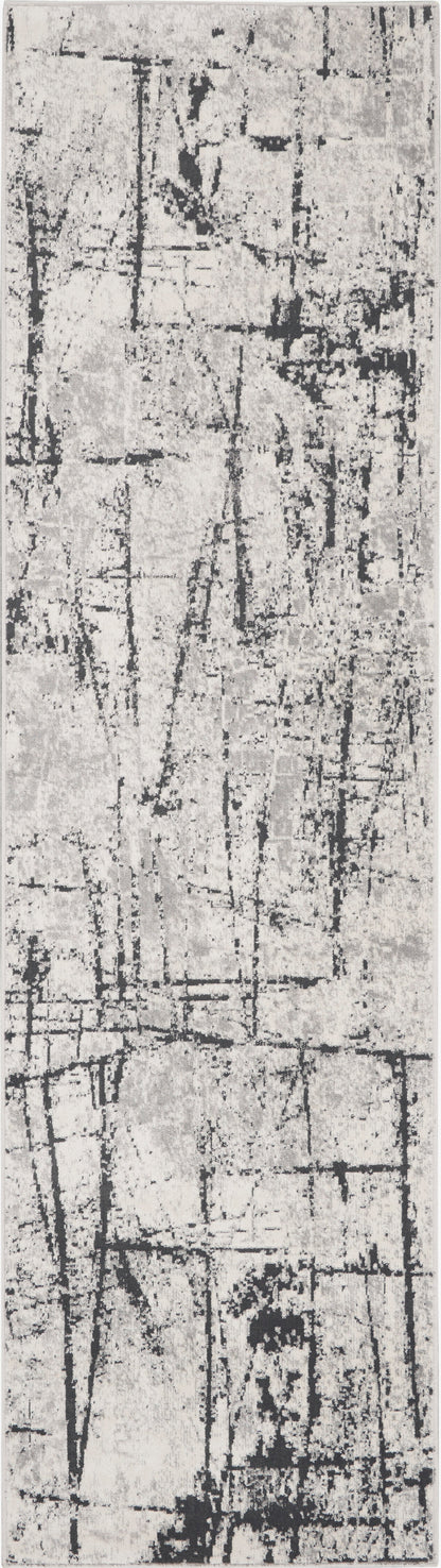 Light gray distressed runner rug with black abstract linear pattern.