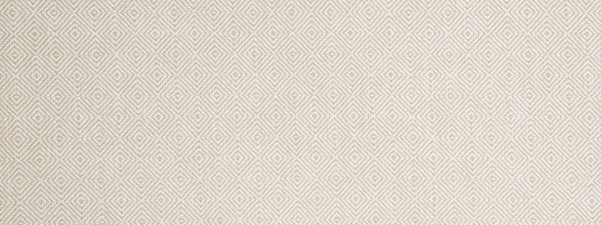 Cream-beige geometric diamond quilted fabric texture with subtle repeating motif.
