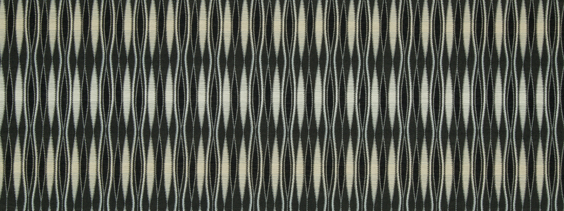 Woven textile with vertical oval motif in cream & light gray on a dark charcoal background.