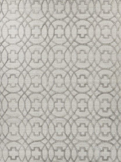 Neutral gray textured rug featuring a repeating interlocking circle pattern with square centers.