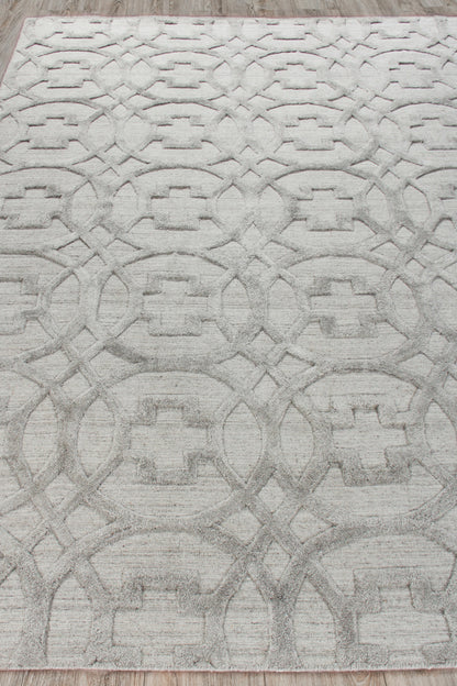 Light gray area rug with raised geometric interlocking circle & square motif; modern, soft texture.