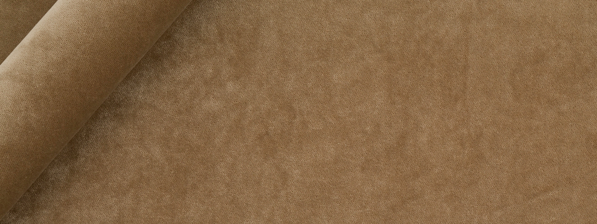Brown textured upholstery fabric on a rolled bolt.